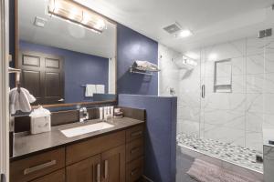 a bathroom with a sink and a shower at Abode on Lower Main Street in Park City +26 photos