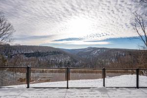 a view of a snow covered mountain with a fence at Bear Cliff Lodge by Railey Vacations in Friendsville