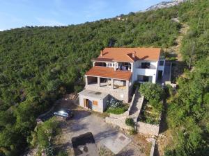 an aerial view of a house on a hill at Apartment Stinica 31b in Jablanac