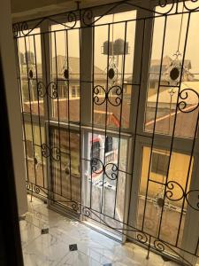 an open window with a view of a building at Otijoe Premier Hotel in Port Harcourt