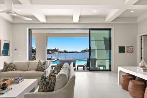 a living room with a couch and a table at 283 Lakeview Drive in Seagrove Beach
