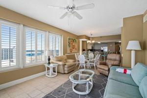 a living room with a couch and a table at Jade East Towers 1850 in Destin