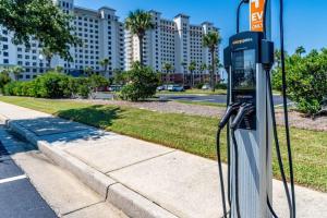 a pay phone on the side of a street at Beach Club 806A by Youngs Suncoast in Gulf Highlands