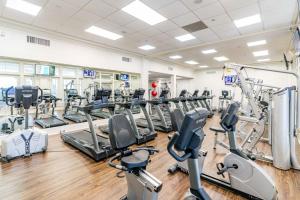a gym with several treadmills and cardio machines at Beach Club 806A by Youngs Suncoast in Gulf Highlands +87 photos