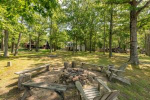 a group of benches and a fire pit in a park at Smooth Sailing by Railey Vacations in Swanton