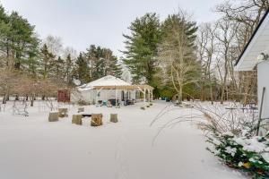 a gazebo in the snow in a yard at Woodsy & Charming! Applegate Cabin w/ Large Yard in Applegate