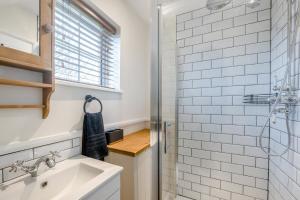 a bathroom with a sink and a shower at 2 Bed in Wickhampton oc-t34449 in Wickhampton +19 photos