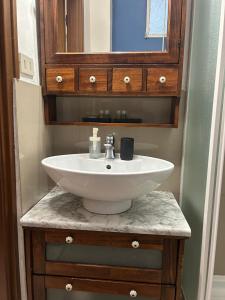 a bathroom with a sink and a mirror at Grace 101 in Vigevano +78 photos