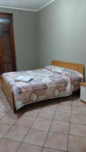 a bedroom with a bed in a room at Casa Castel San Giovanni in Castel San Giovanni