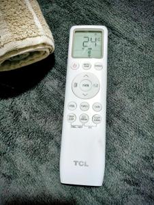 a remote control sitting on top of a table at GuestHouse3 Karma369 in Plovdiv +7 photos