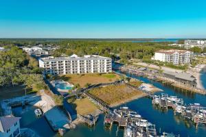 an aerial view of a resort with a marina at Harbor Cove 404 in Orange Beach