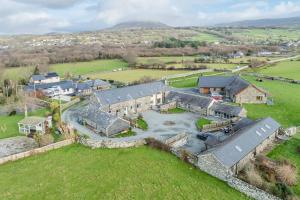 an aerial view of a large house with a yard at Melin-Bennar in Dyffryn