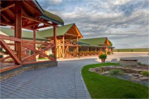a rendering of a building with a pavilion at Kryształowa poddasze in Józefów