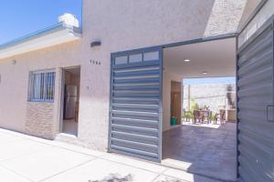 a garage door on the side of a building at Departamentos Valle de los Andes in San Rafael