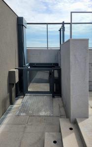 an open door on the side of a building at Condomínio Residencial - Hype 017 | by Housi in Sao Jose do Rio Preto
