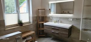 a bathroom with a sink and a mirror at Sternenhimmel in Lenz