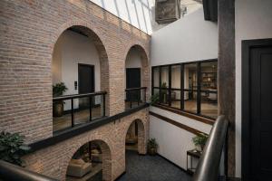 a brick building with three arches on the side at Brick & Bed Riverfront Lofts, T 410 in Saint Louis
