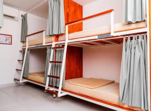 a room with bunk beds in a hostel at Onederz Koh Rong Sanloem in Koh Rong Sanloem