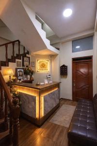 a lobby with a reception desk in a building at Hospedaje chakana inn in Cusco