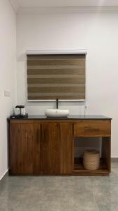 a bathroom with a sink and a window at Agasthi Airport Close in Katunayaka +59 photos