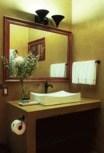 Um banheiro em La Isabela Suites
