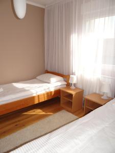 Postel nebo postele na pokoji v ubytování Hostel S
