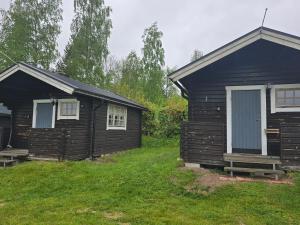 a couple of buildings sitting next to each other at Edsken Camping in Hofors