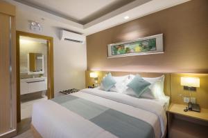 Postel nebo postele na pokoji v ubytování Watergate Boutique Hotel