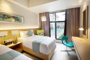 Postel nebo postele na pokoji v ubytování Watergate Boutique Hotel