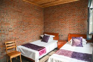 Beijing Mutianyu Great Wall Wangshanyuan Homestay客房内的一张或多张床位