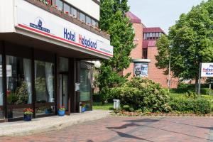 Facaden eller indgangen til Hotel Helgoland