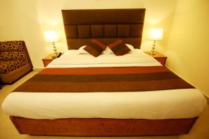 Postel nebo postele na pokoji v ubytování Hotel Parkway Deluxe