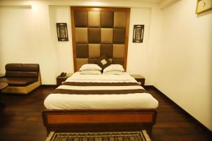 Postel nebo postele na pokoji v ubytování Hotel Parkway Deluxe