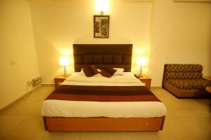 Postel nebo postele na pokoji v ubytování Hotel Parkway Deluxe