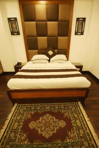 Postel nebo postele na pokoji v ubytování Hotel Parkway Deluxe