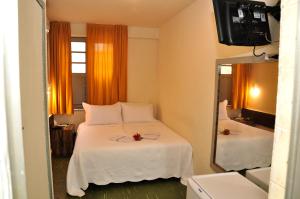 Ένα ή περισσότερα κρεβάτια σε δωμάτιο στο Hotel Plaza Riazor