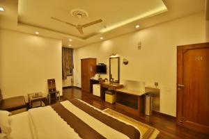 TV a/nebo společenská místnost v ubytování Hotel Parkway Deluxe