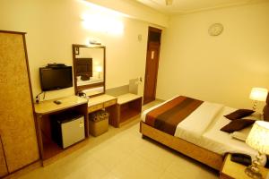 Postel nebo postele na pokoji v ubytování Hotel Parkway Deluxe