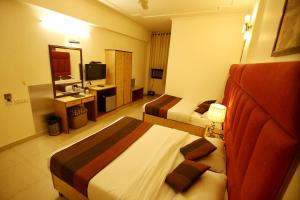 TV a/nebo společenská místnost v ubytování Hotel Parkway Deluxe