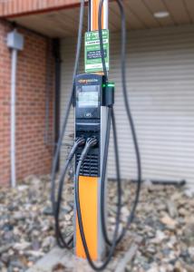 a pay phone is tied to a pole at Gibsons Garden Hotel in Gibsons