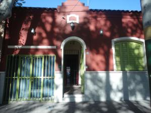 The facade or entrance of Casa Pueblo Hostel