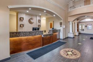 a lobby of a hotel with a star on the floor at Comfort Inn & Suites Lubbock West in Lubbock +26 photos