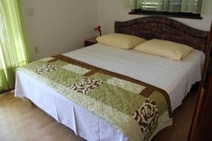 Postel nebo postele na pokoji v ubytování Apartments Kronja