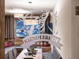 a sign on a dining room table with a istg istg istg istg istg istg istg at Farmhouse in Schwendau with Ski Storage in Hippach