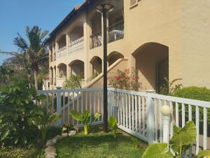 a house with a white railing and a balcony at Crayfish Inn No.4 in Ramsgate +11 photos