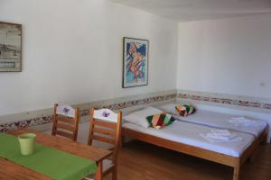 Postel nebo postele na pokoji v ubytování Apartments Unija Duga Uvala