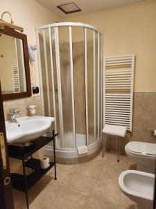 a bathroom with a shower and a sink at Pretoria Collection in Potenza +22 photos