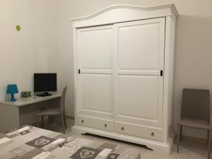 Telewizja i/lub zestaw kina domowego w obiekcie Casa Comasia