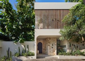 a house with a courtyard with cactus at Lyvin Bingin Villas in Uluwatu +191 photos