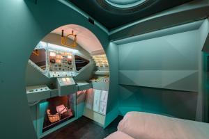 a room with a bed in a room with a window at Apollo11 in Collepietra